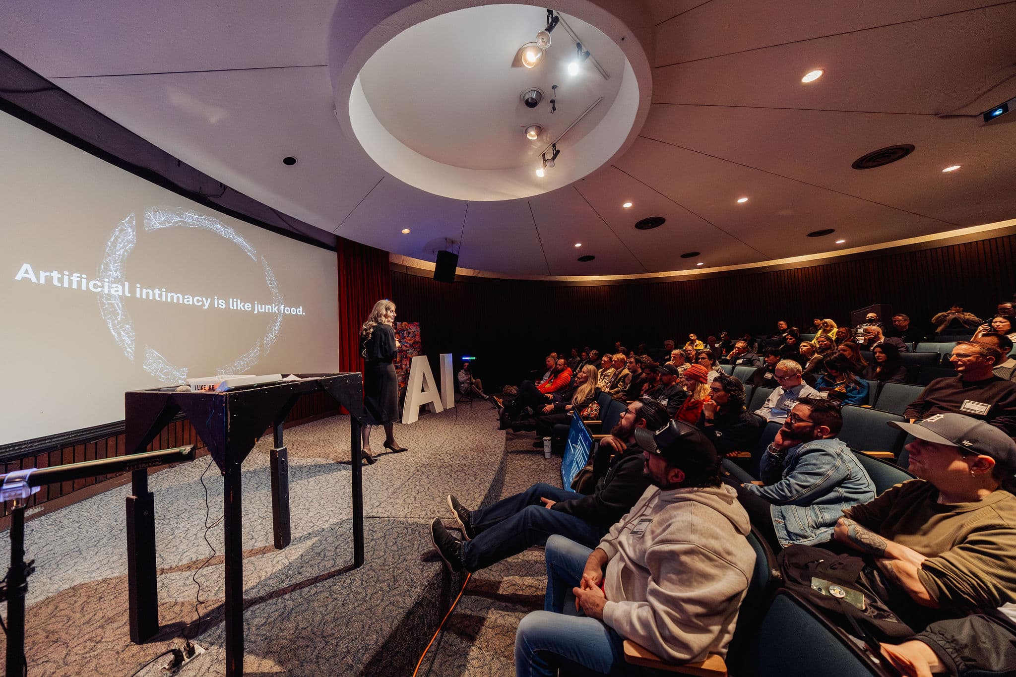 Packed auditorium at Vancouver AI Meetup inside H.R. MacMillan Space Centre