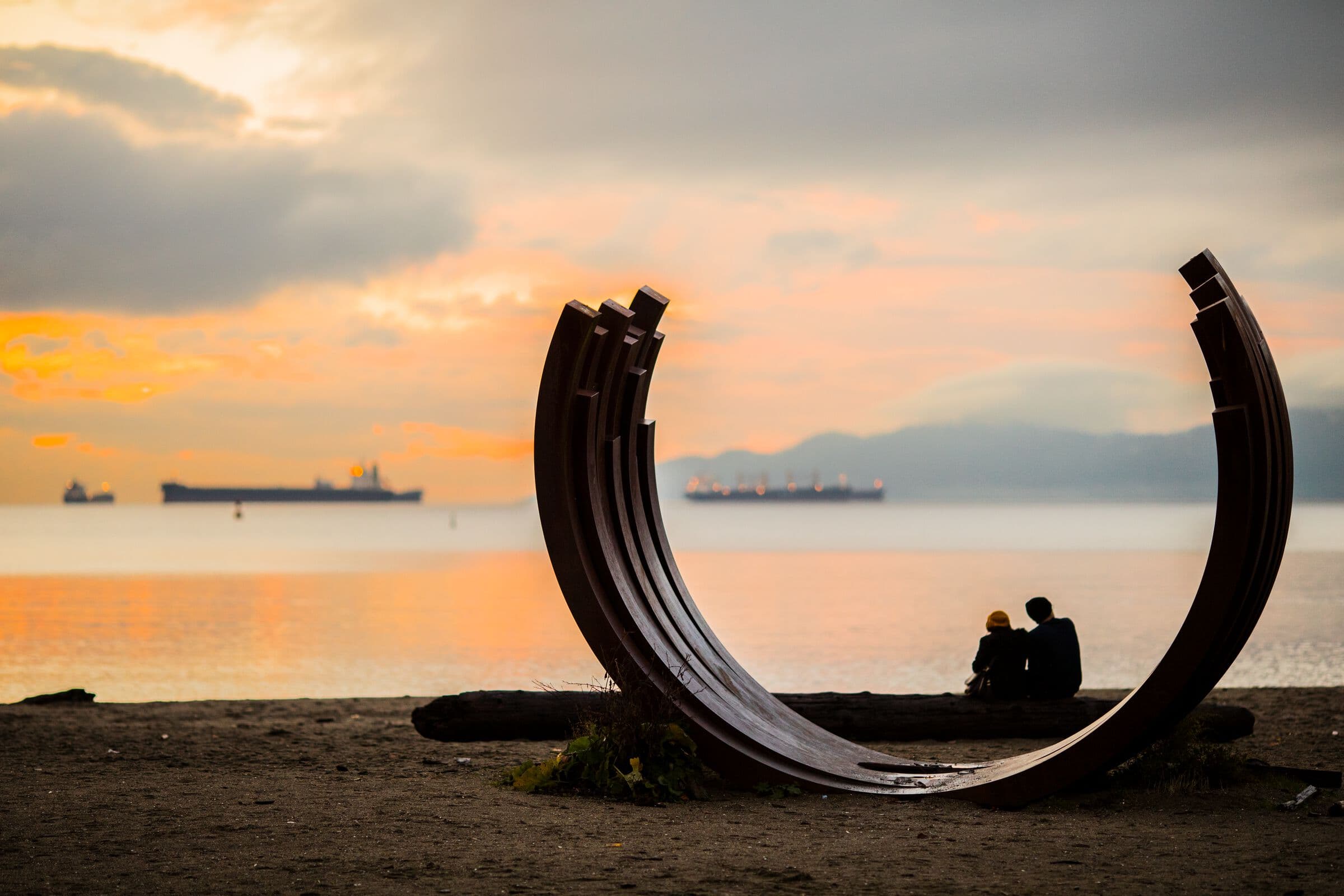 English Bay Arc sculpture at sunset